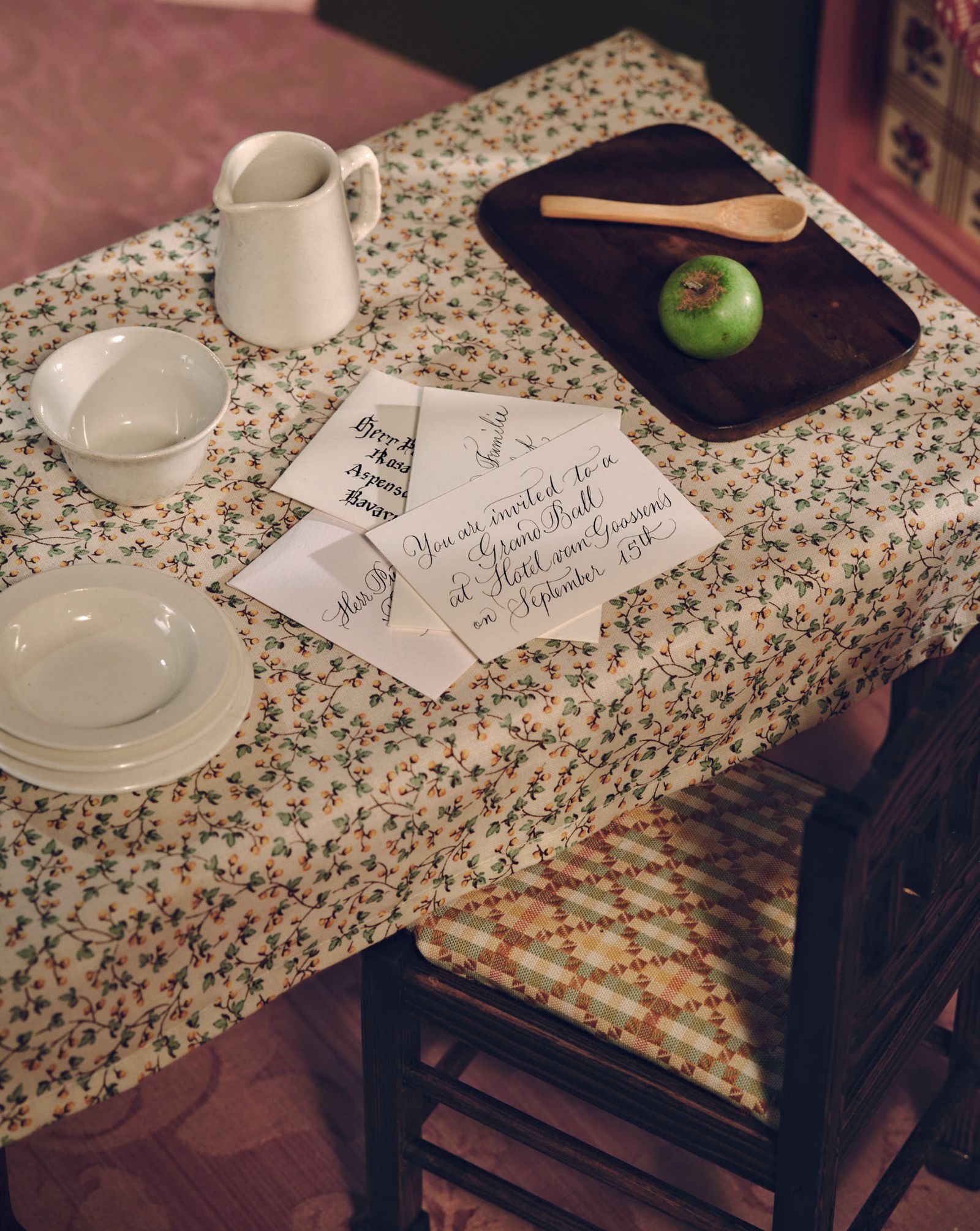 Image may contain Furniture Table Tabletop Tablecloth Plate Dining Table Cutlery and Text