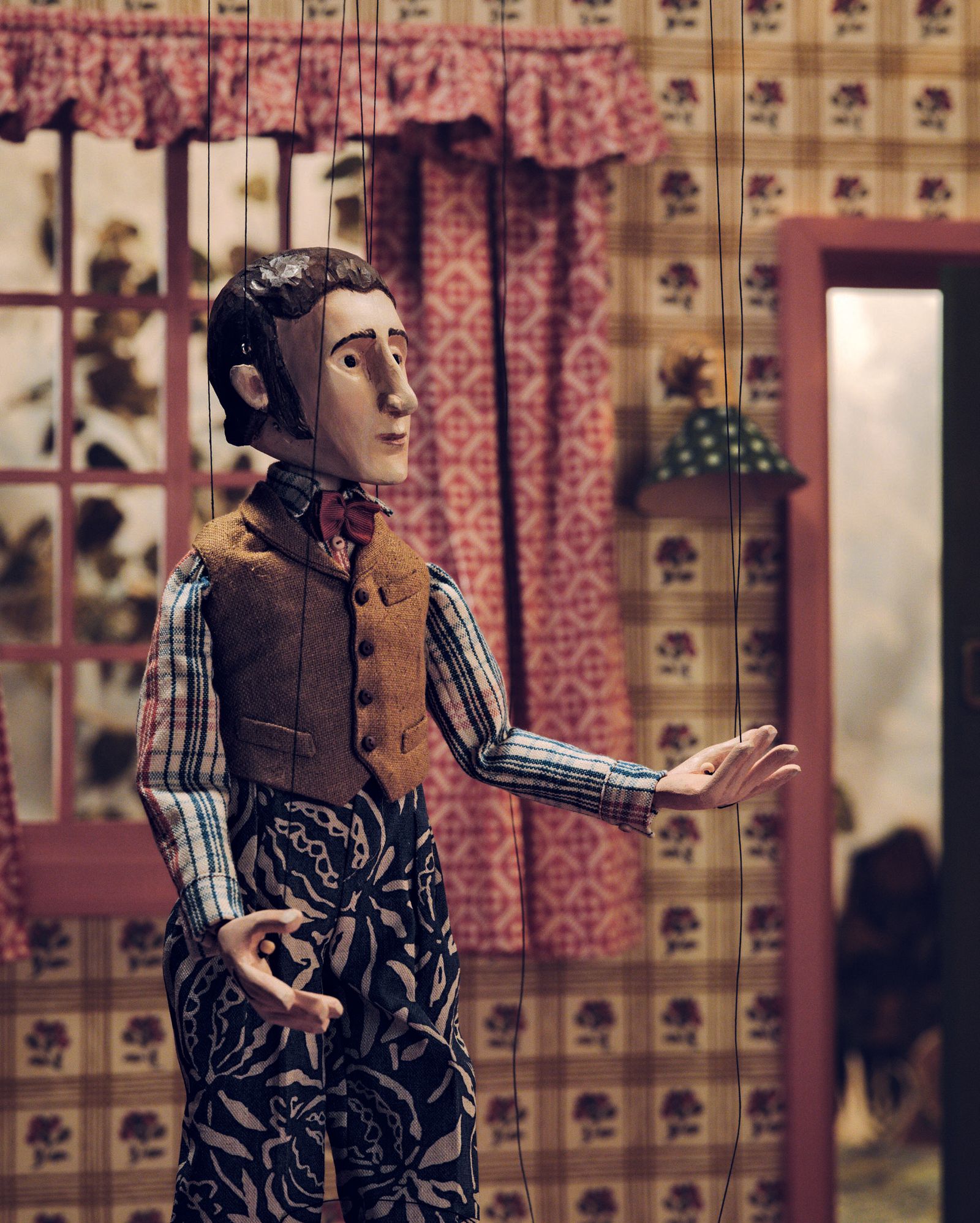Image may contain Adult Person Toy Clothing and Coat