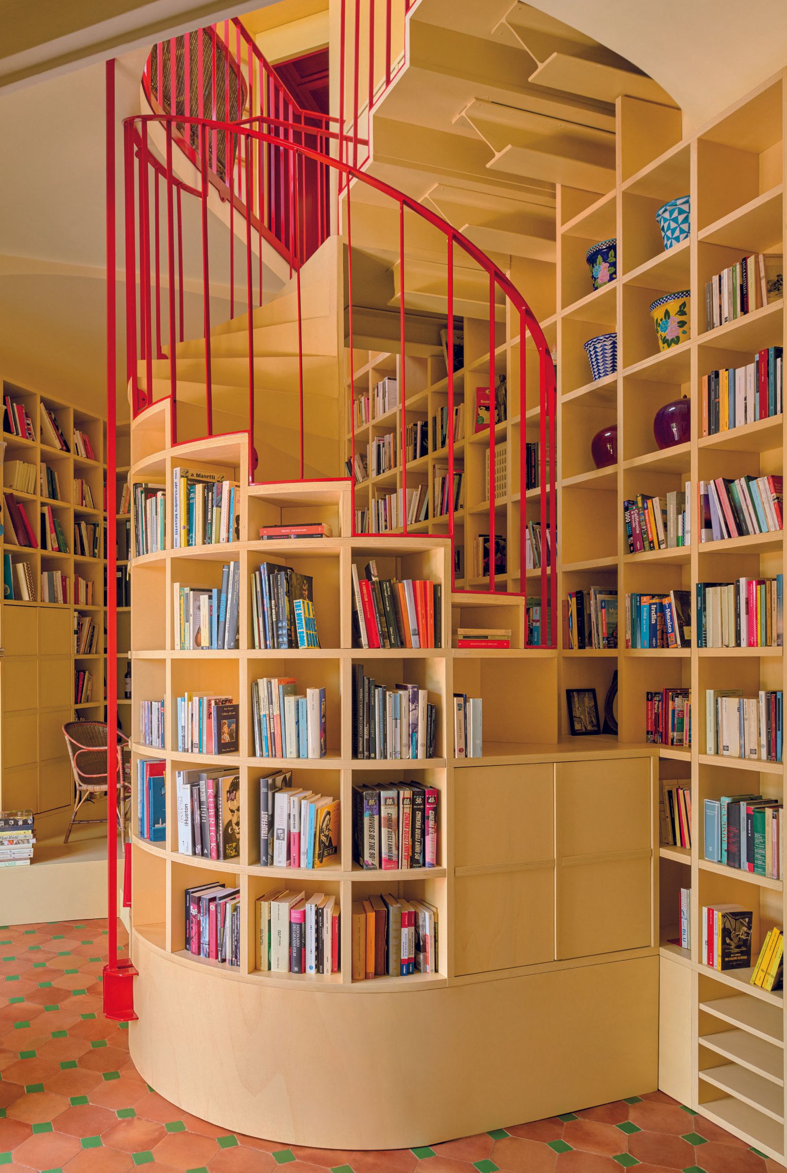 Image may contain Furniture Bookcase Architecture Building House Housing and Staircase