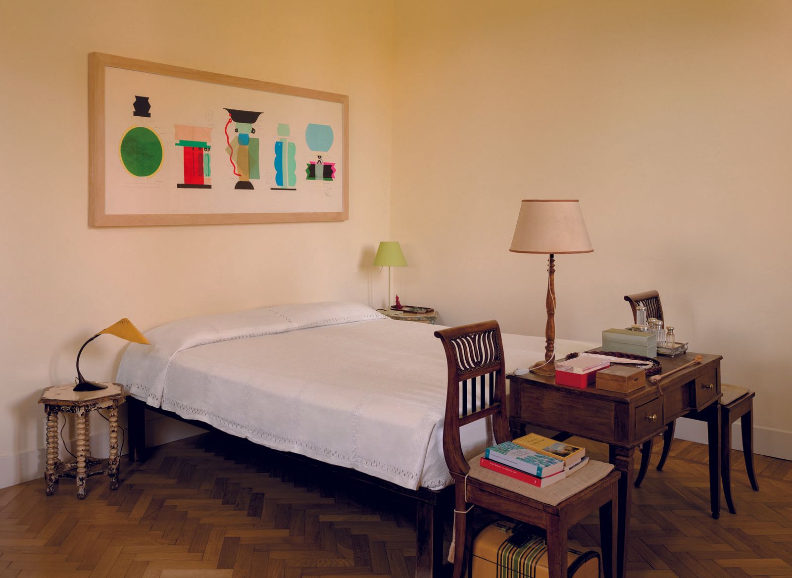 Image may contain Lamp Table Lamp Bed Furniture Indoors Interior Design Chair Bedroom Room and Corner