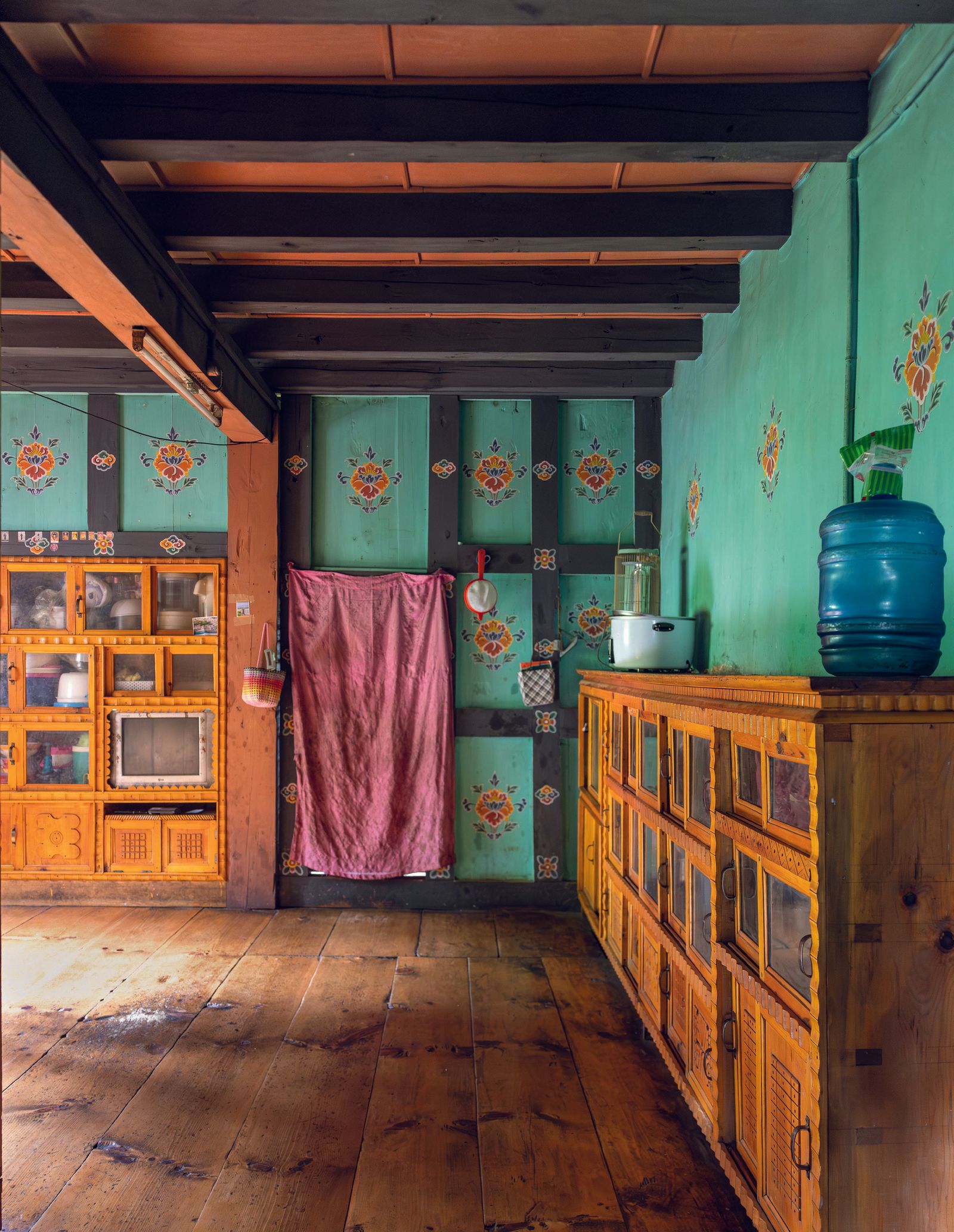 Image may contain Indoors Interior Design Wood Floor Closet Cupboard Furniture Hardwood and Flooring