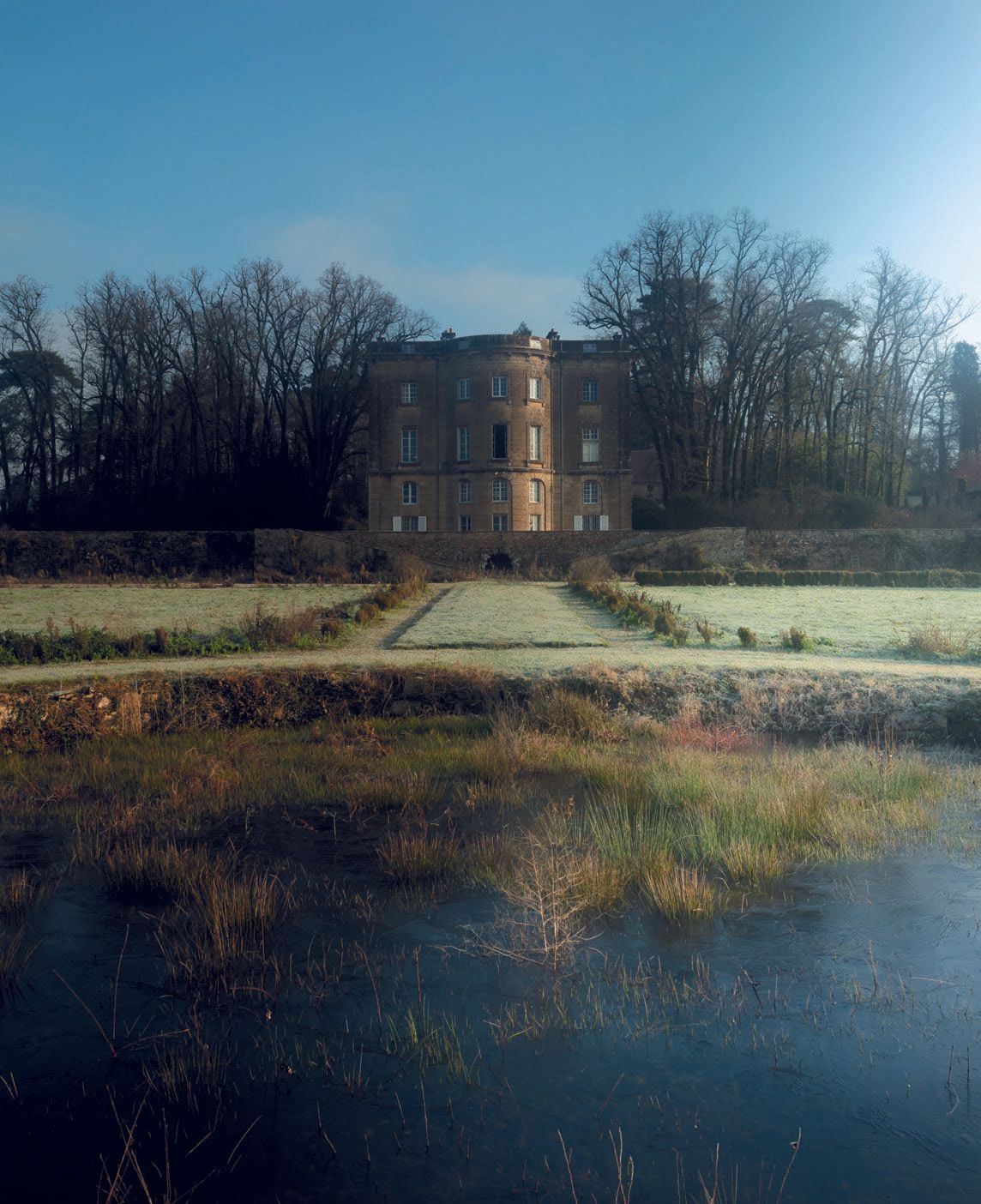 Image may contain Architecture Building Housing House Manor Water and Outdoors