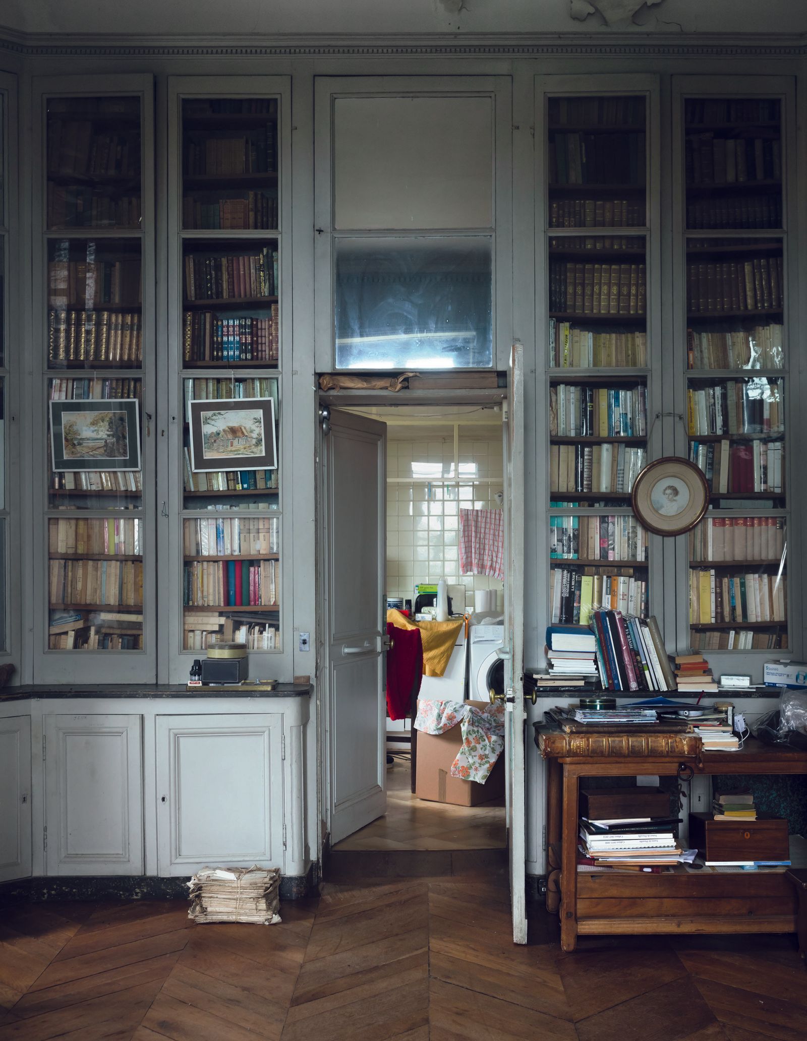 Image may contain Furniture Bookcase Book Indoors Library Publication Art and Painting
