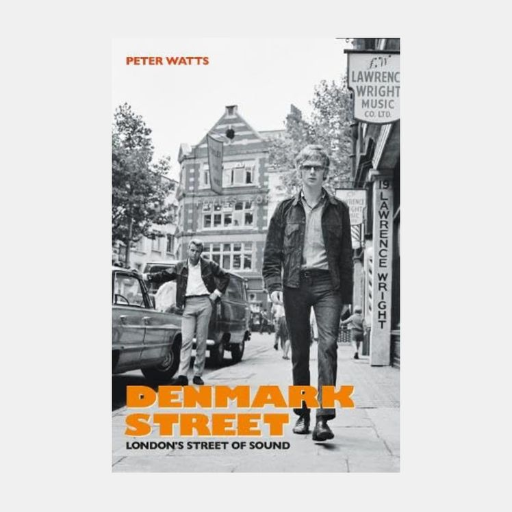 Image may contain Andrew Loog Oldham City Road Street Urban Advertisement Poster Clothing Coat and Photography