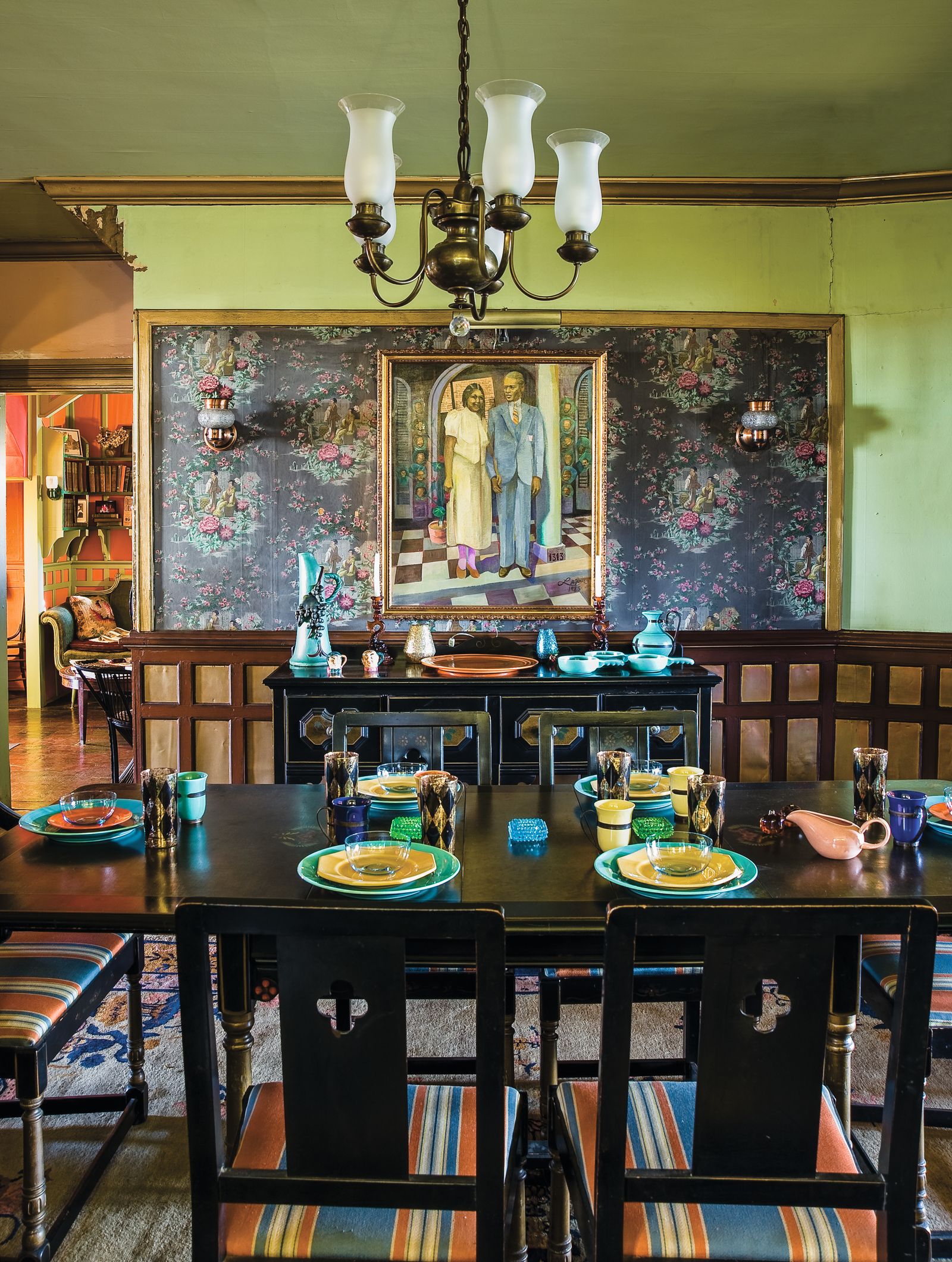 Image may contain Architecture Building Dining Room Dining Table Furniture Indoors Room Table Lamp and Chandelier