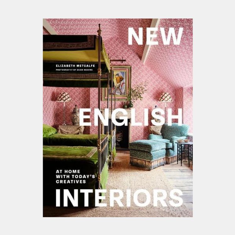 Image may contain Lamp Furniture Bed Bunk Bed Architecture Building Hostel Housing Person and Couch