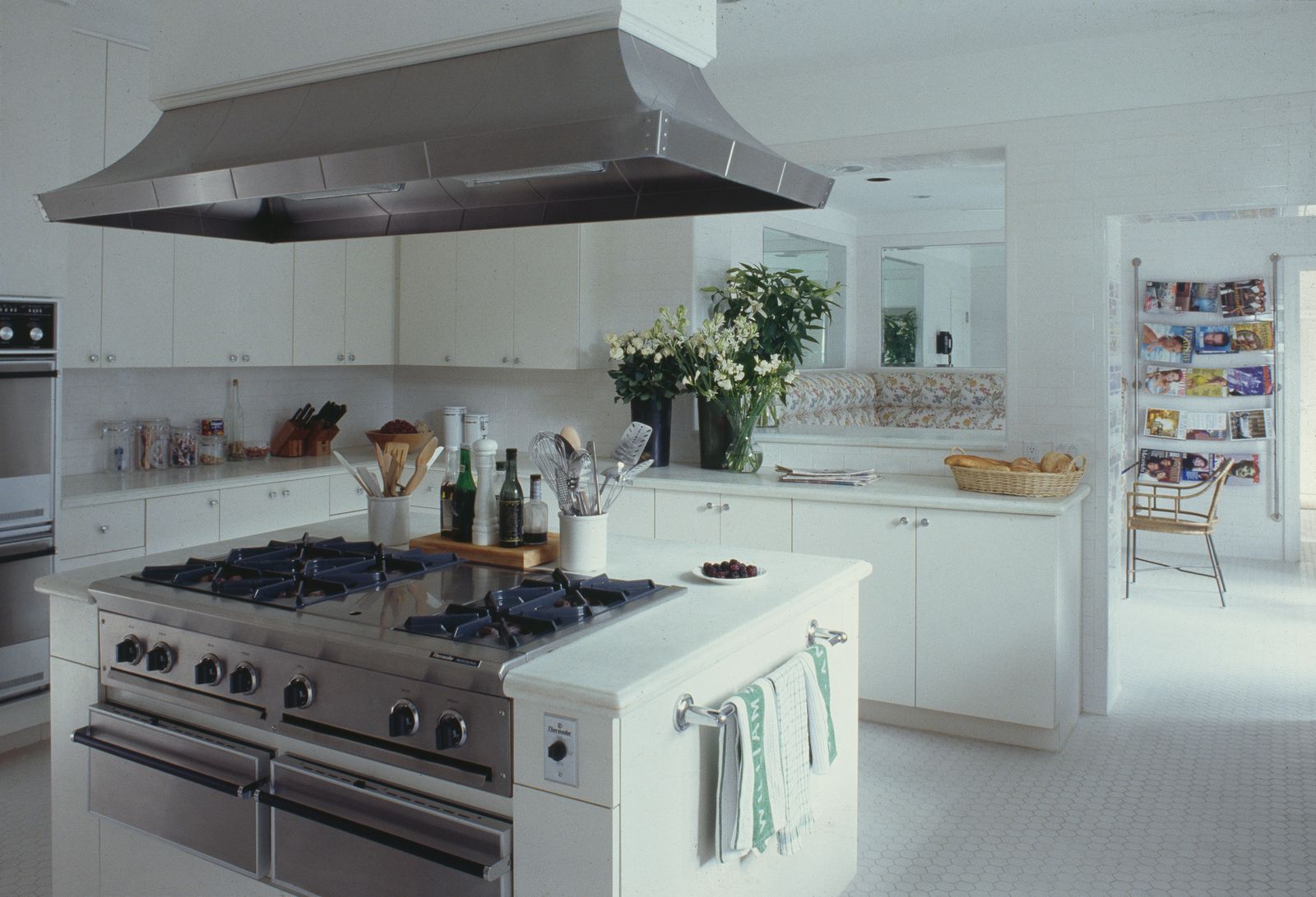 Image may contain Indoors Kitchen Cooktop Cup and Kitchen Island